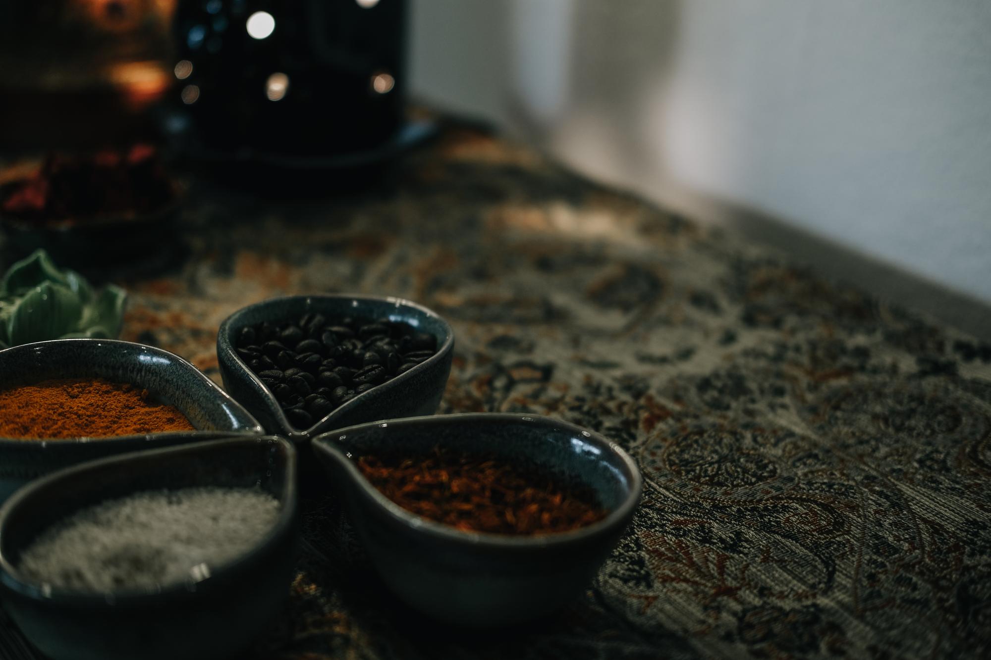 Close-up of spice jars and herbs